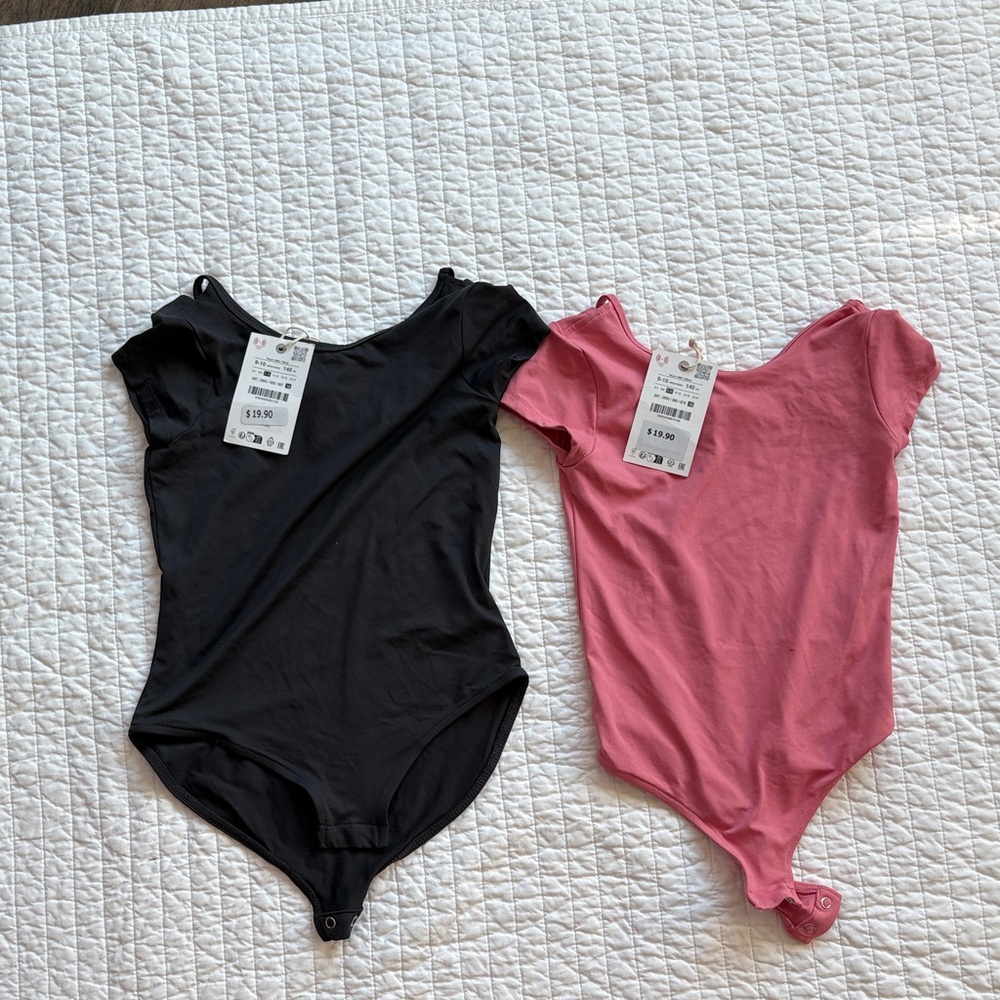 Black and Pink NWT size 9-10 bodysuits